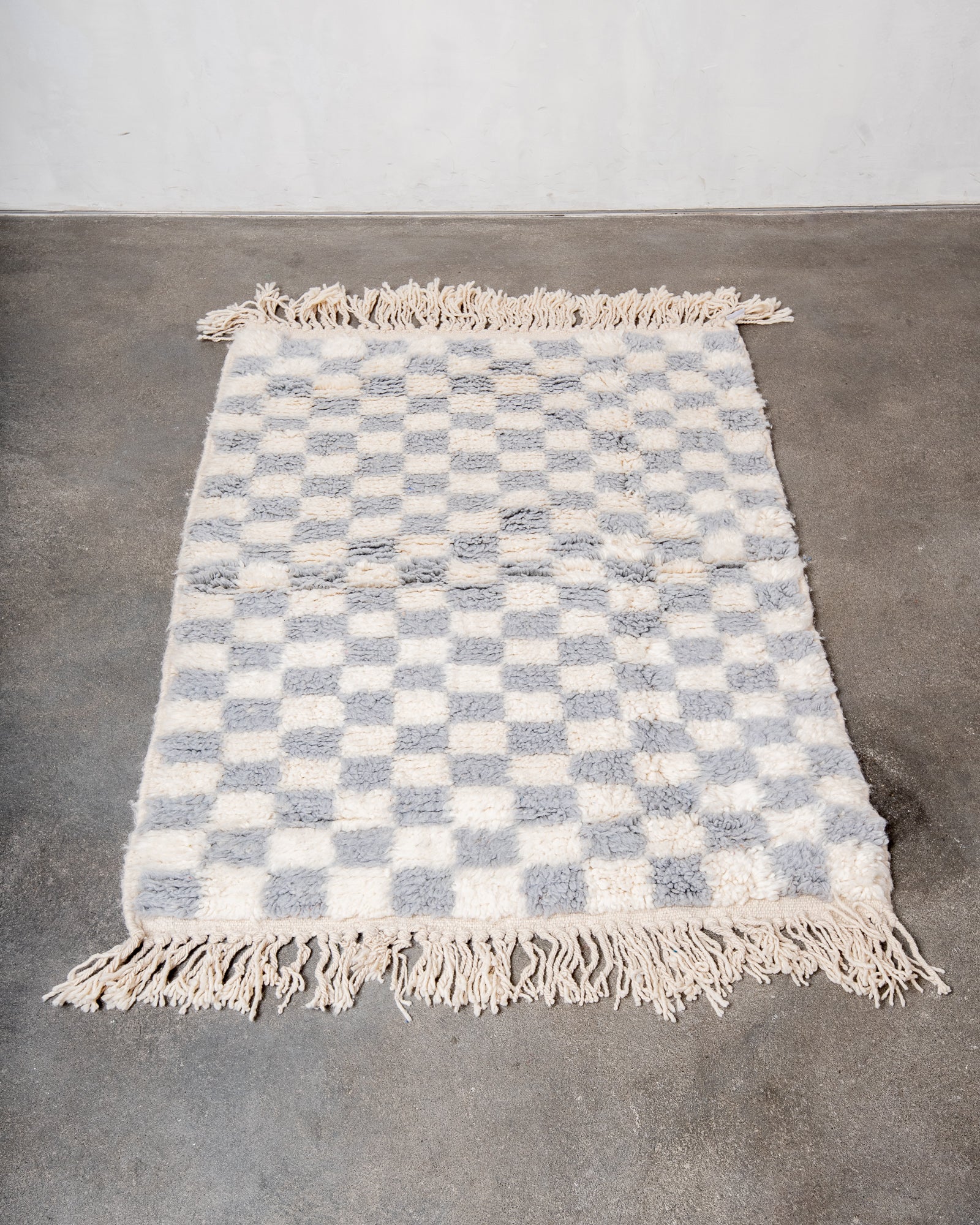Modern, designer, handcrafted Berber rug from Morocco. Beniourain carpet with beautiful colours and patterns and fluffy wool texture.